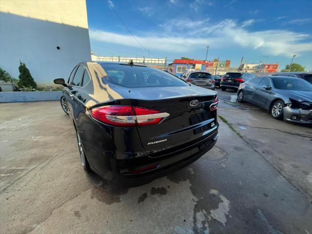 used 2019 Ford Fusion car, priced at $16,999