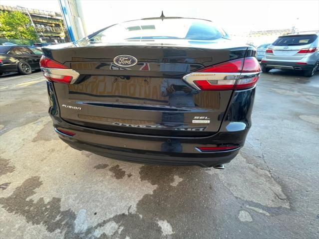 used 2019 Ford Fusion car, priced at $16,999