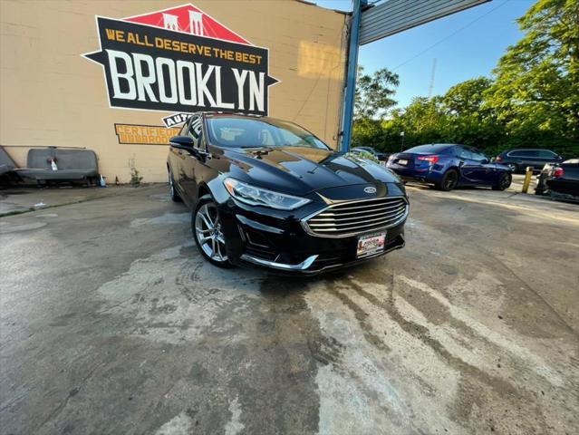 used 2019 Ford Fusion car, priced at $16,999