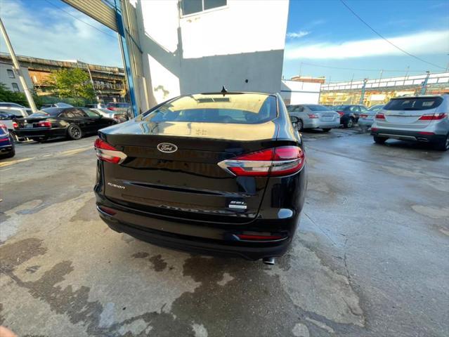 used 2019 Ford Fusion car, priced at $16,999