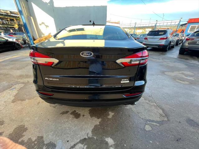 used 2019 Ford Fusion car, priced at $16,999