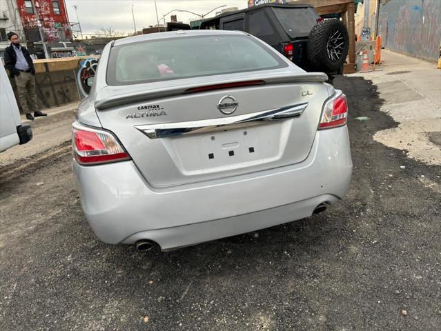 used 2015 Nissan Altima car, priced at $9,999