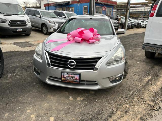 used 2015 Nissan Altima car, priced at $9,999