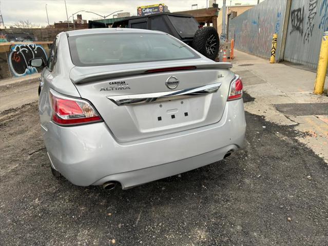 used 2015 Nissan Altima car, priced at $9,999