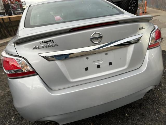 used 2015 Nissan Altima car, priced at $9,999