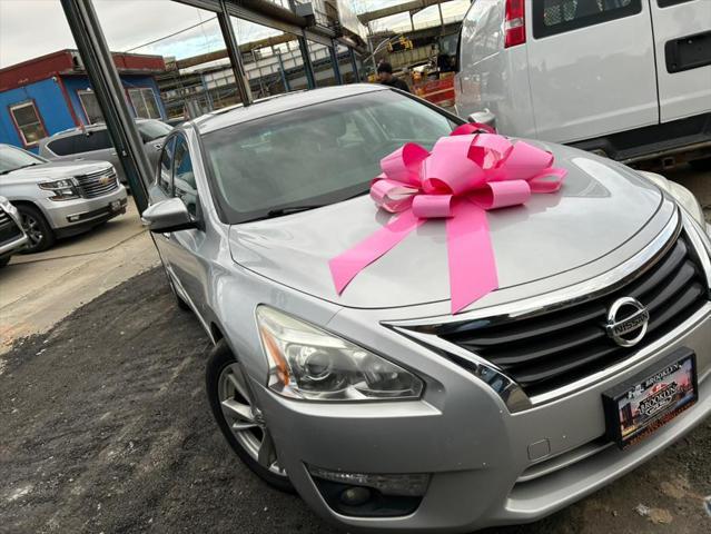 used 2015 Nissan Altima car, priced at $9,999