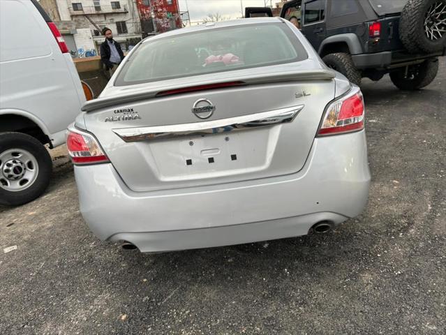 used 2015 Nissan Altima car, priced at $9,999