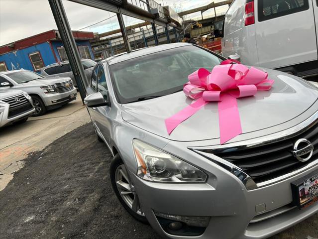 used 2015 Nissan Altima car, priced at $9,999