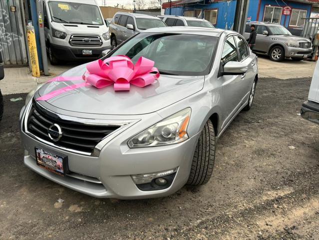 used 2015 Nissan Altima car, priced at $9,999