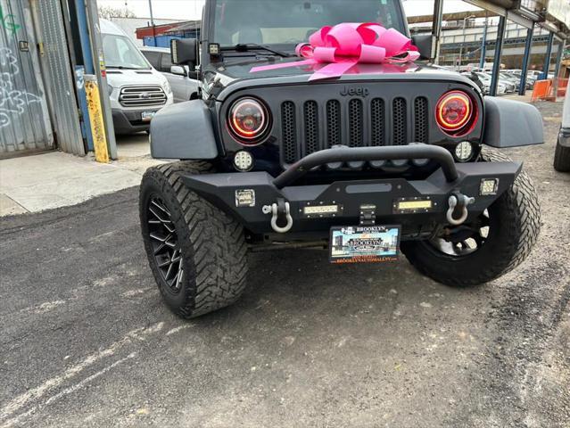 used 2016 Jeep Wrangler Unlimited car, priced at $23,999