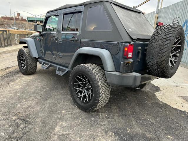 used 2016 Jeep Wrangler Unlimited car, priced at $23,999