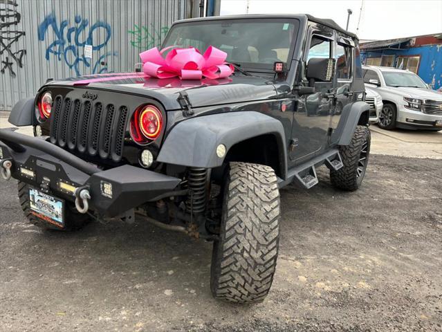 used 2016 Jeep Wrangler Unlimited car, priced at $23,999