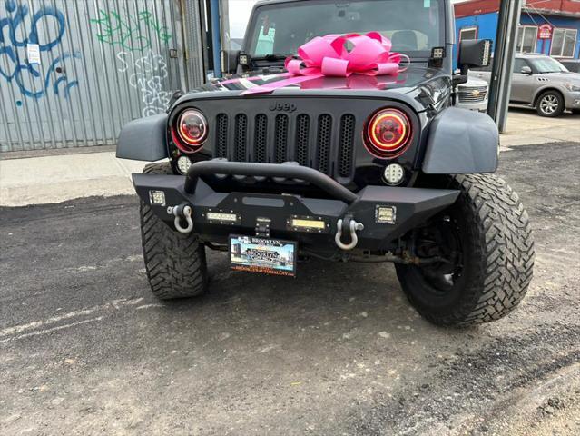 used 2016 Jeep Wrangler Unlimited car, priced at $23,999