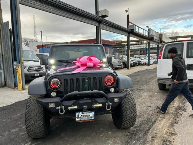 used 2016 Jeep Wrangler Unlimited car, priced at $23,999