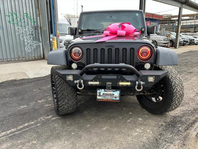 used 2016 Jeep Wrangler Unlimited car, priced at $23,999