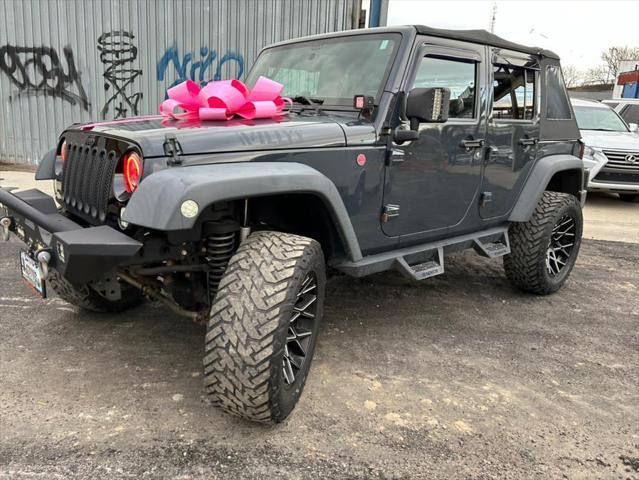 used 2016 Jeep Wrangler Unlimited car, priced at $23,999