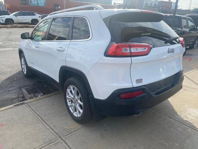 used 2014 Jeep Cherokee car, priced at $11,999