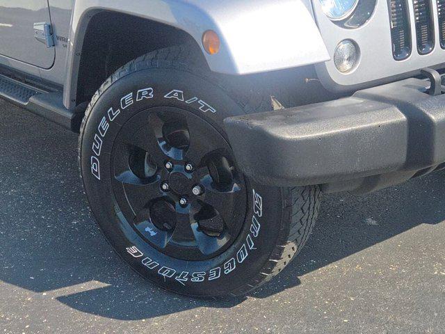 used 2015 Jeep Wrangler Unlimited car, priced at $18,918