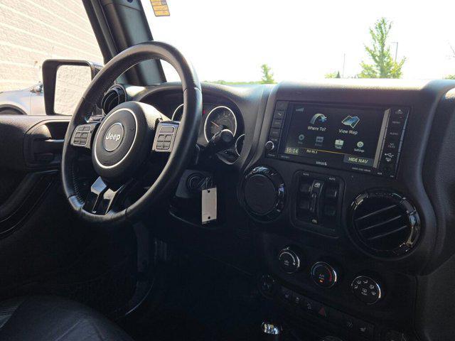 used 2015 Jeep Wrangler Unlimited car, priced at $18,540