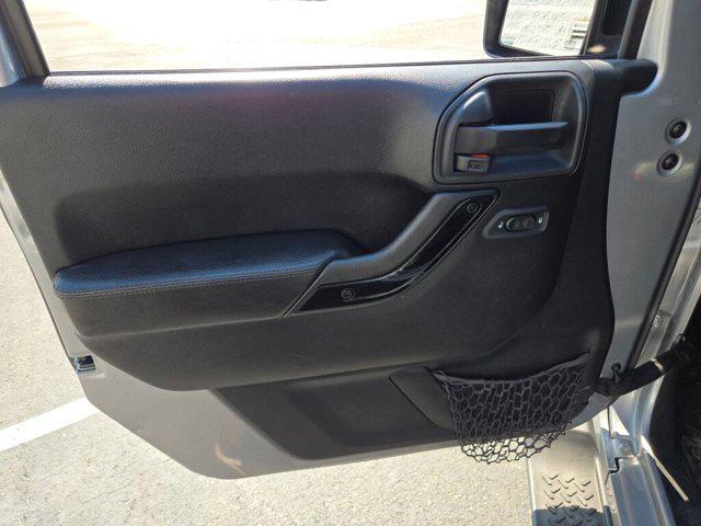 used 2015 Jeep Wrangler Unlimited car, priced at $18,540