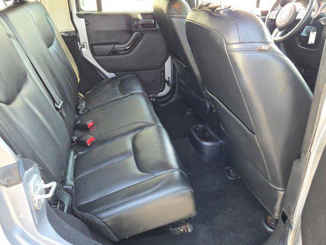 used 2015 Jeep Wrangler Unlimited car, priced at $18,540