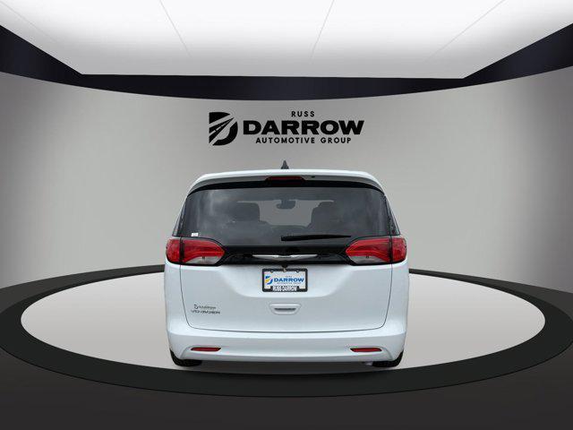 used 2023 Chrysler Voyager car, priced at $23,918