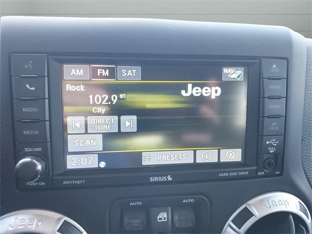 used 2015 Jeep Wrangler Unlimited car, priced at $18,679