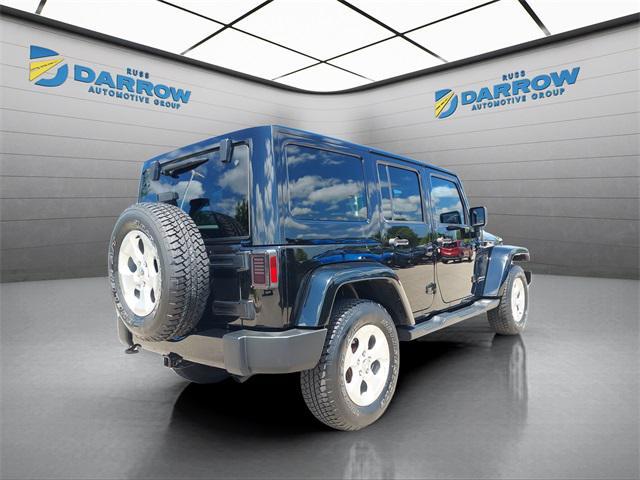 used 2015 Jeep Wrangler Unlimited car, priced at $18,679