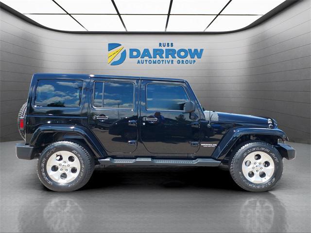 used 2015 Jeep Wrangler Unlimited car, priced at $18,679