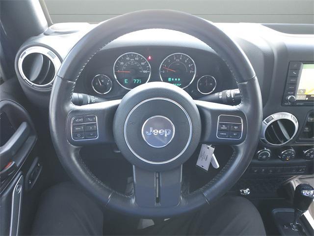 used 2015 Jeep Wrangler Unlimited car, priced at $18,679