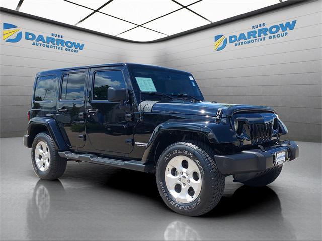 used 2015 Jeep Wrangler Unlimited car, priced at $18,679