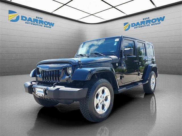 used 2015 Jeep Wrangler Unlimited car, priced at $19,229