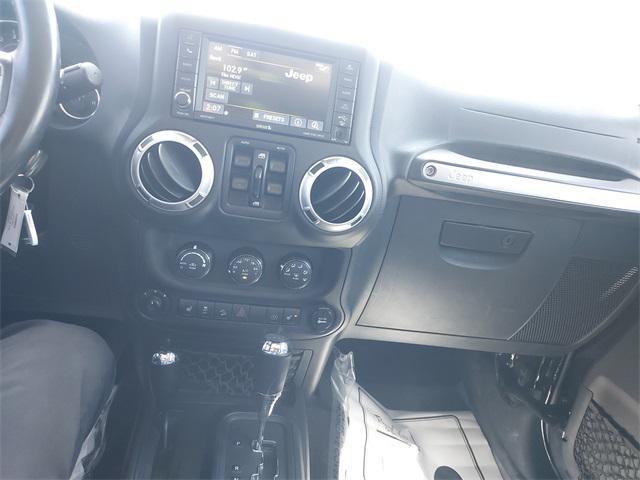used 2015 Jeep Wrangler Unlimited car, priced at $18,679