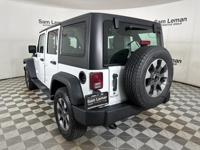 used 2013 Jeep Wrangler Unlimited car, priced at $18,450