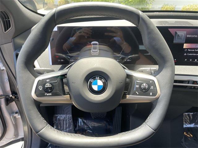 new 2026 BMW iX car, priced at $82,075