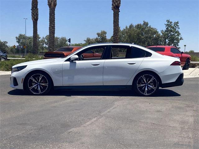 used 2025 BMW 550e car, priced at $66,291