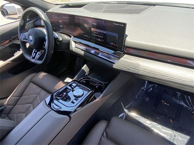 used 2025 BMW 550e car, priced at $66,291