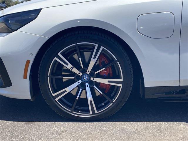 used 2025 BMW 550e car, priced at $66,291