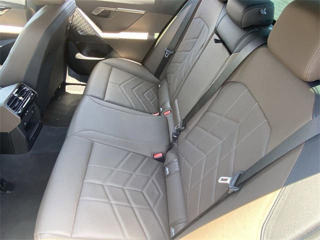 used 2025 BMW 550e car, priced at $66,291