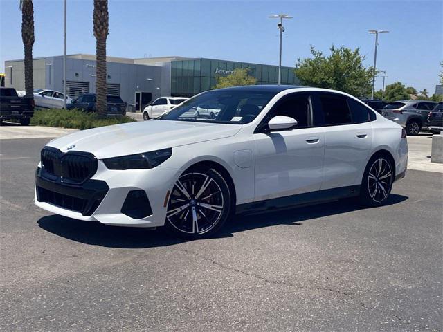 used 2025 BMW 550e car, priced at $66,291