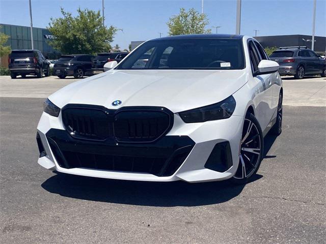 used 2025 BMW 550e car, priced at $66,291