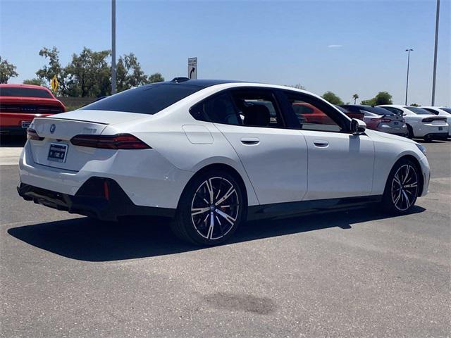 used 2025 BMW 550e car, priced at $66,291