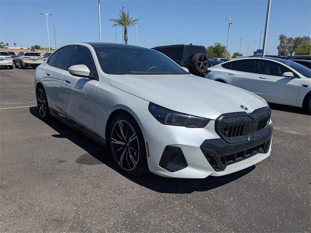 used 2025 BMW 550e car, priced at $79,498