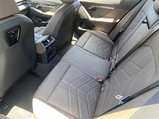 used 2025 BMW 550e car, priced at $66,291