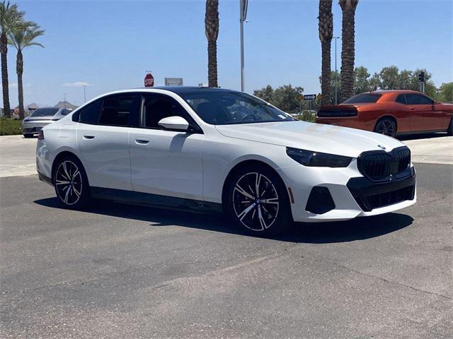 used 2025 BMW 550e car, priced at $66,291