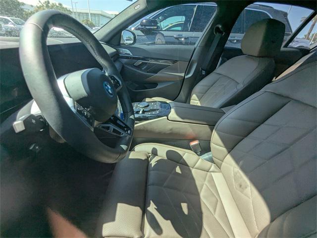 used 2025 BMW 550e car, priced at $79,498