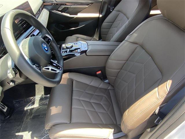 used 2025 BMW 550e car, priced at $66,291
