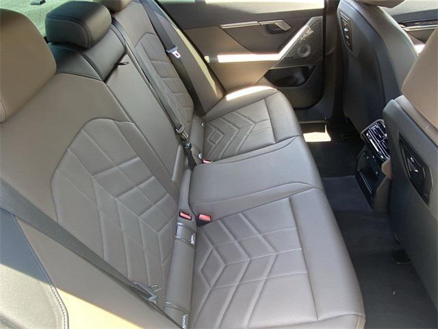 used 2025 BMW 550e car, priced at $66,291