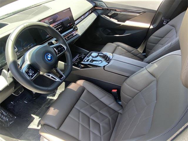used 2025 BMW 550e car, priced at $66,291