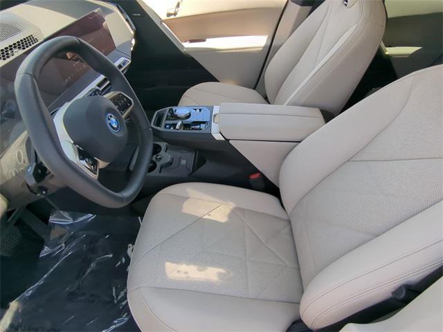 new 2025 BMW iX car, priced at $96,825